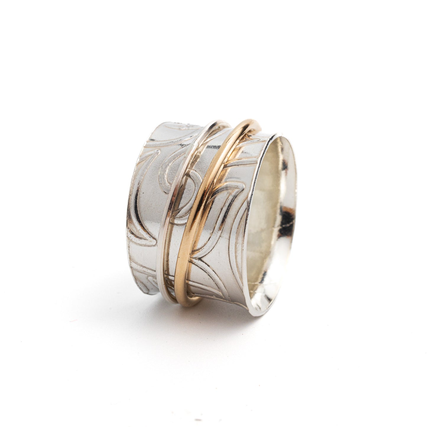 Sterling silver LOTUS pattern spinner ring.