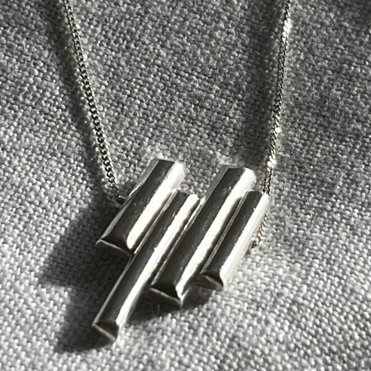 Sterling silver driftwood pendant inspired by Dollymount beach Dublin Ireland