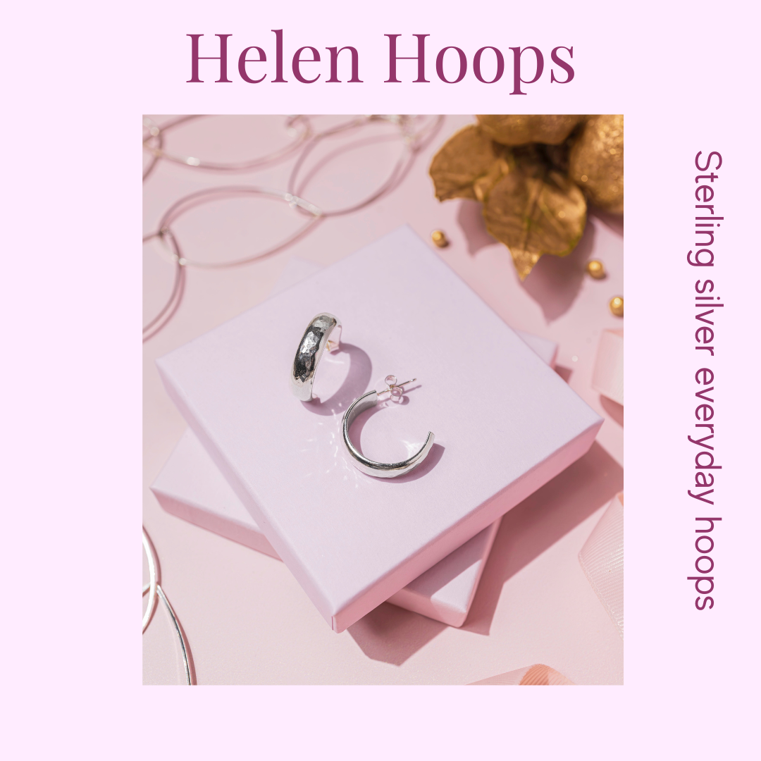 sterling silver hoop earrings size 16mm in circumference on a pink background