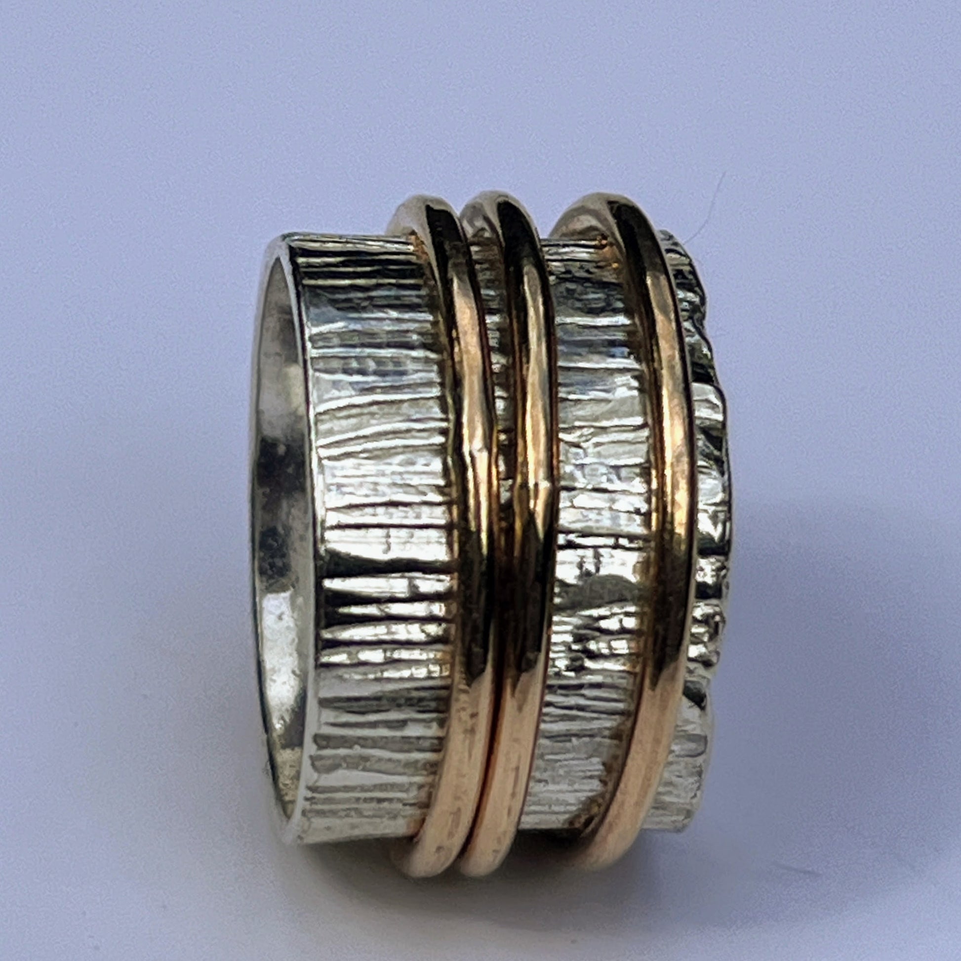 side view of spinner ring with three gold filled spinner rings