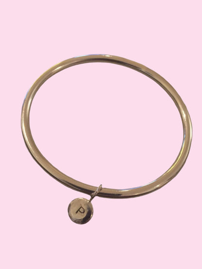 solid handmade 925 sterling silver bangle with silver disc and the initial P secured with a secure sterling silver closed jump ring