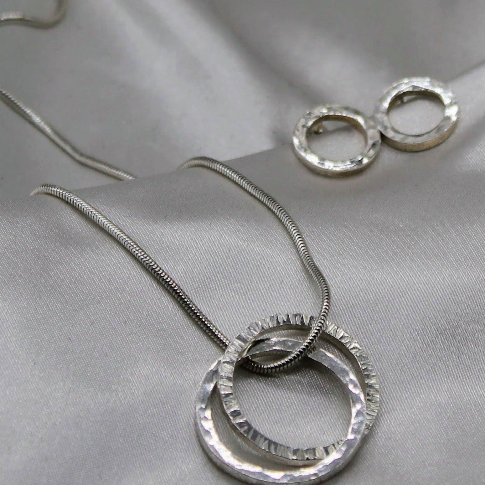 sterling silver necklace two circles interlinked on a silver snake chain