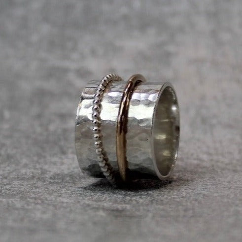 sterling silver hammer finished spinner ring with two spinner tings one beaded one gild filled