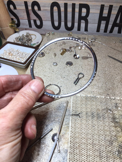 925 sterling silver handmade bangle with drilled holes made in Dublin Ireland