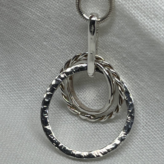 sterling silver mixed loop necklace three different sized rings intertwined 