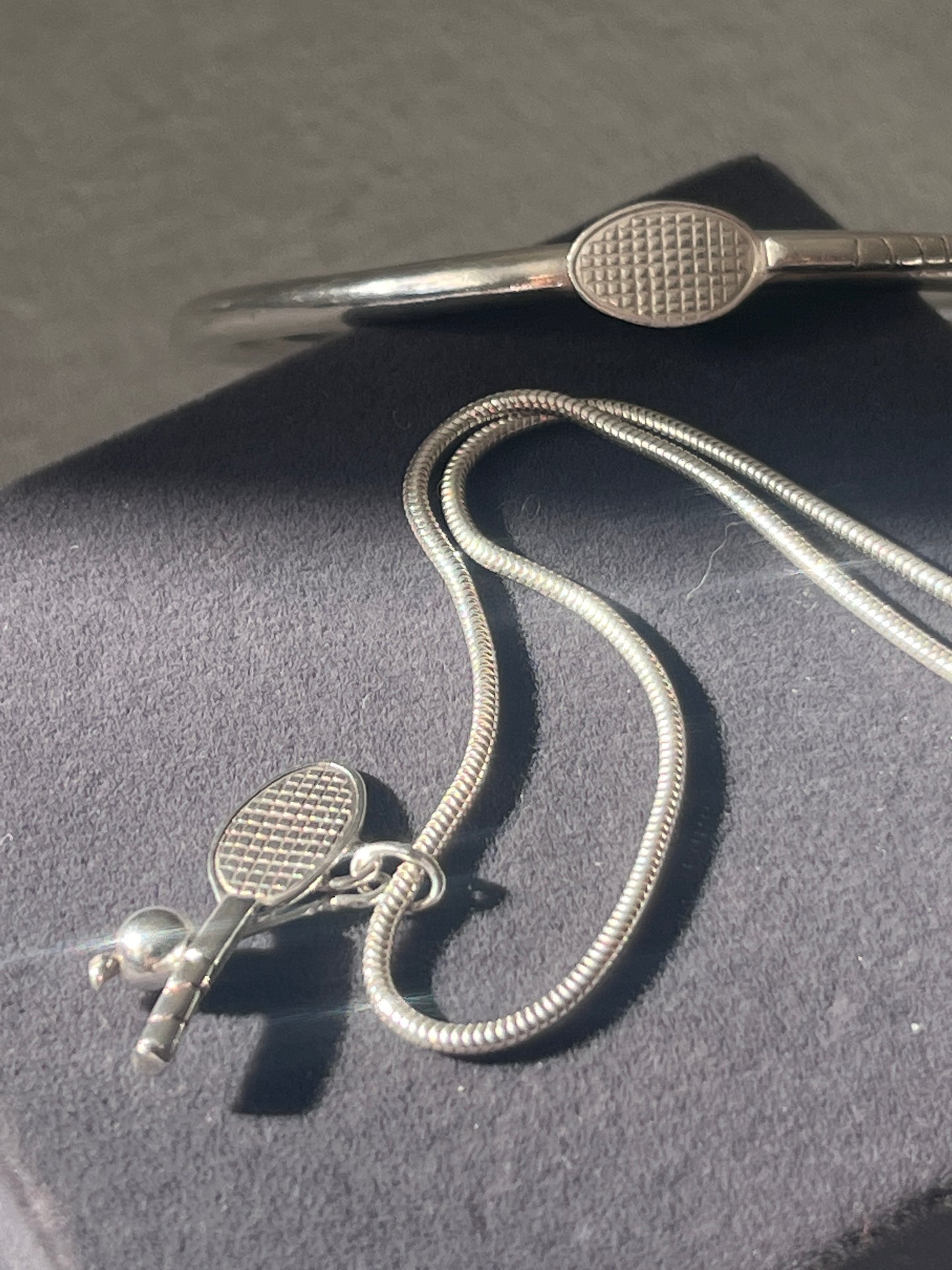 Sterling silver tennis bangle and pendant necklace